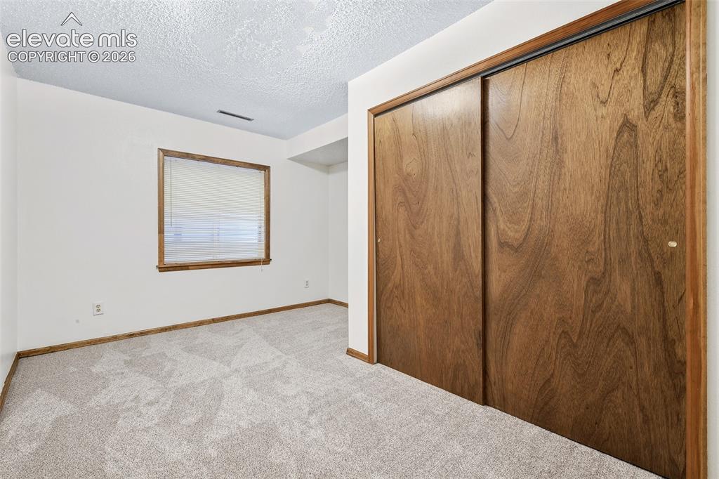 Image 26 of 45: 5th non-conforming bedroom in basement
