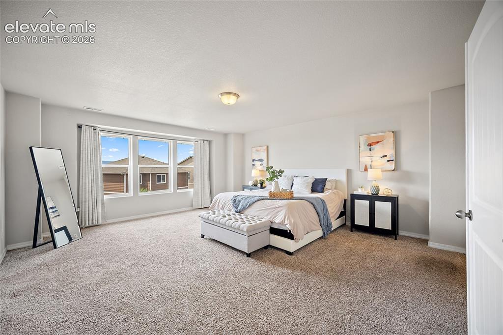 Image 19 of 49: Bedroom