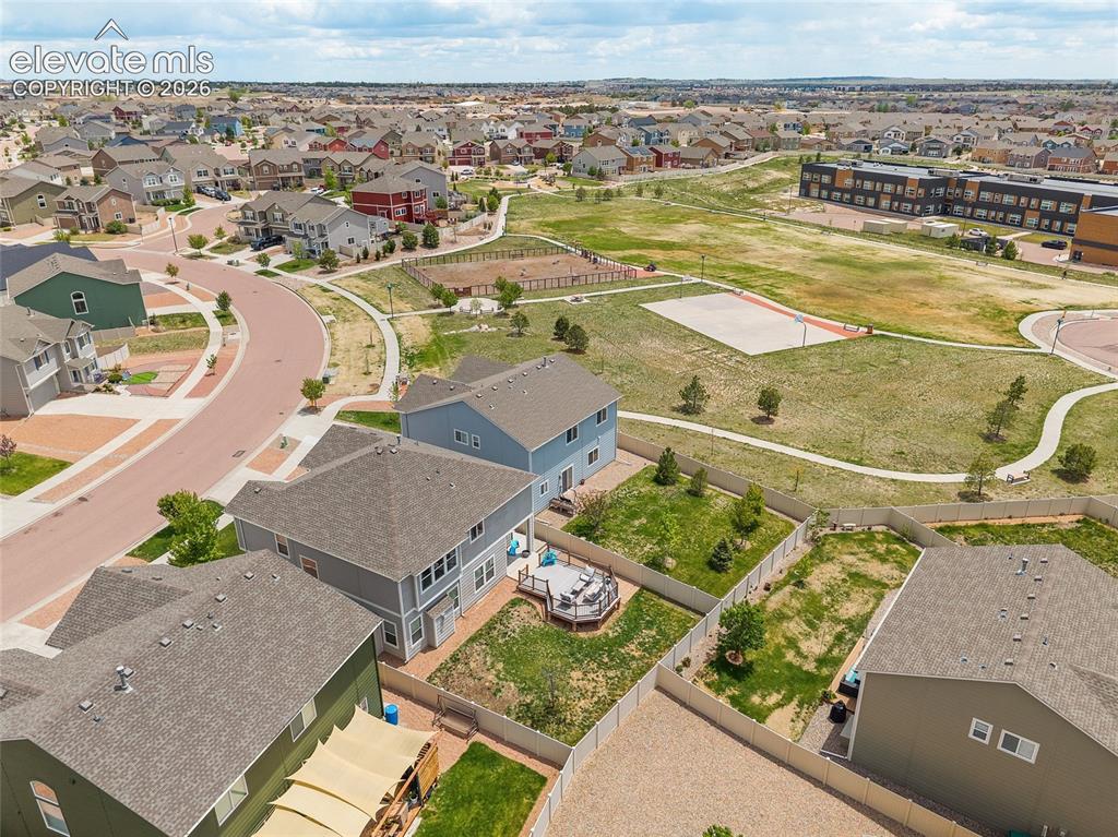 Image 43 of 49: Aerial perspective showcasing a residential community with varied architect