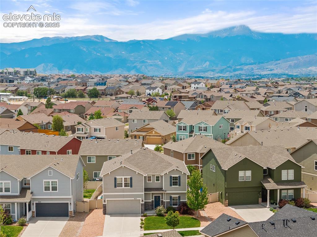 Image 46 of 49: Expansive residential neighborhood featuring a variety of single-family hom