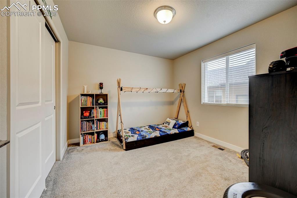 Image 14 of 19: Bedroom