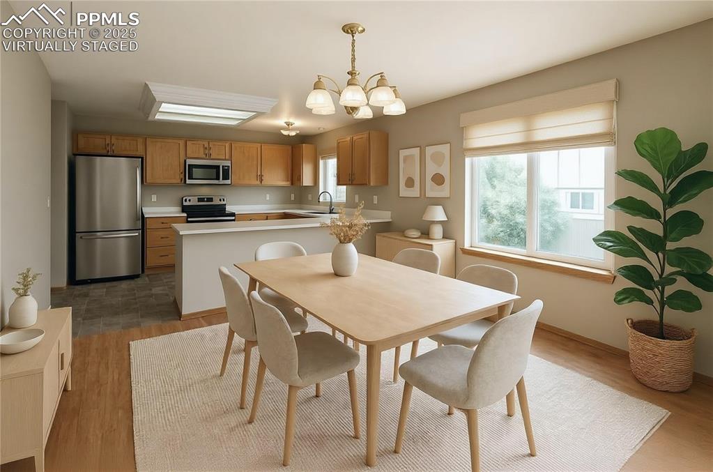 Image 13 of 41: virtually staged dining area
