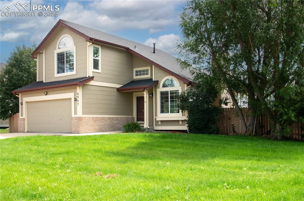 Image 2 of 41: Located on a lovely corner lot