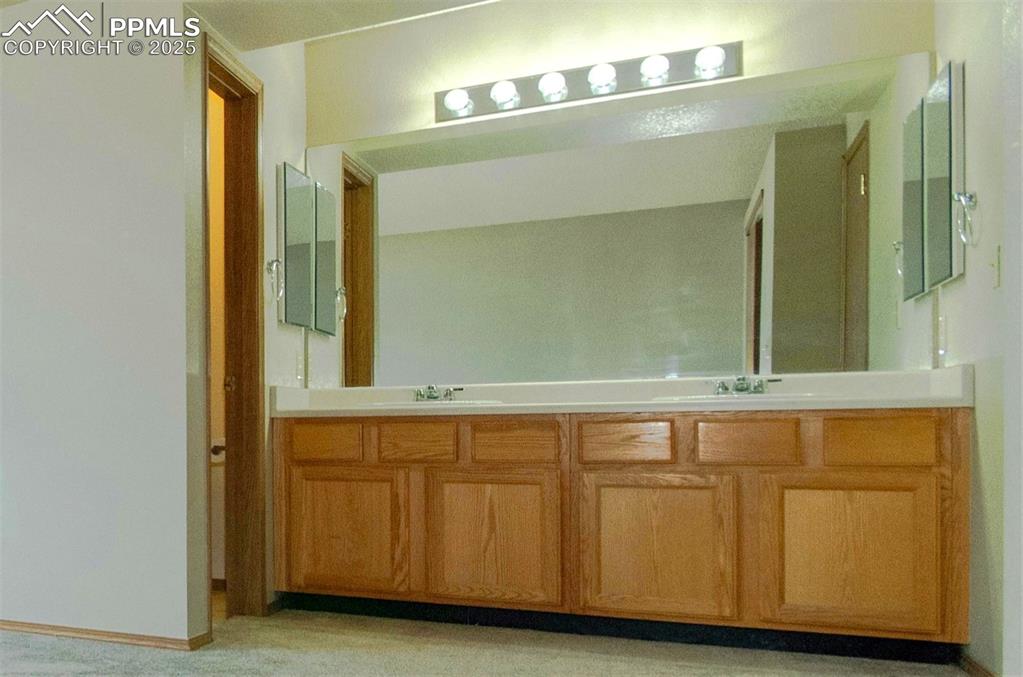 Image 20 of 41: Double vanity with plenty of storage