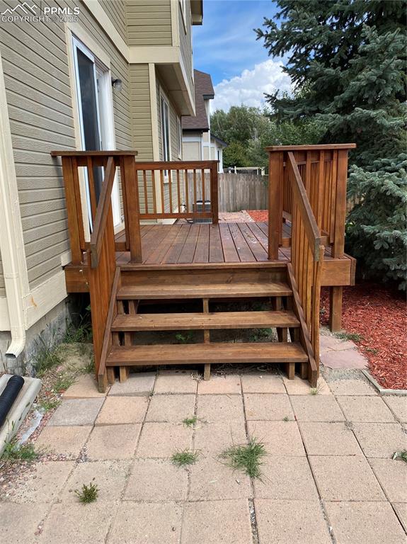 Image 34 of 41: Deck and patio made of pavers