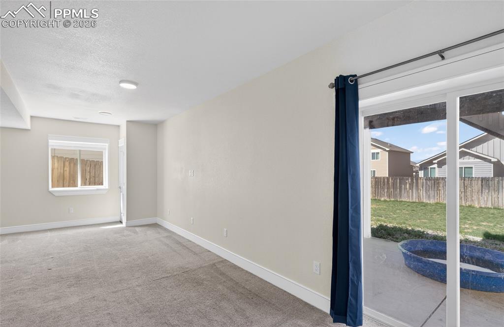 Image 20 of 28: Basement Family room Walkout