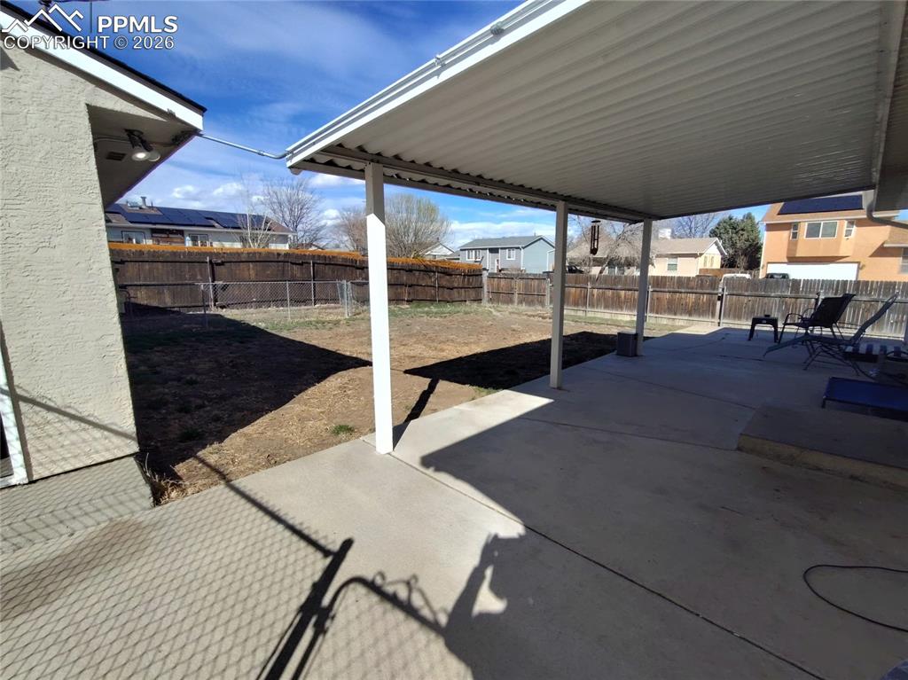 Image 40 of 45: Backyard/spacious patio
