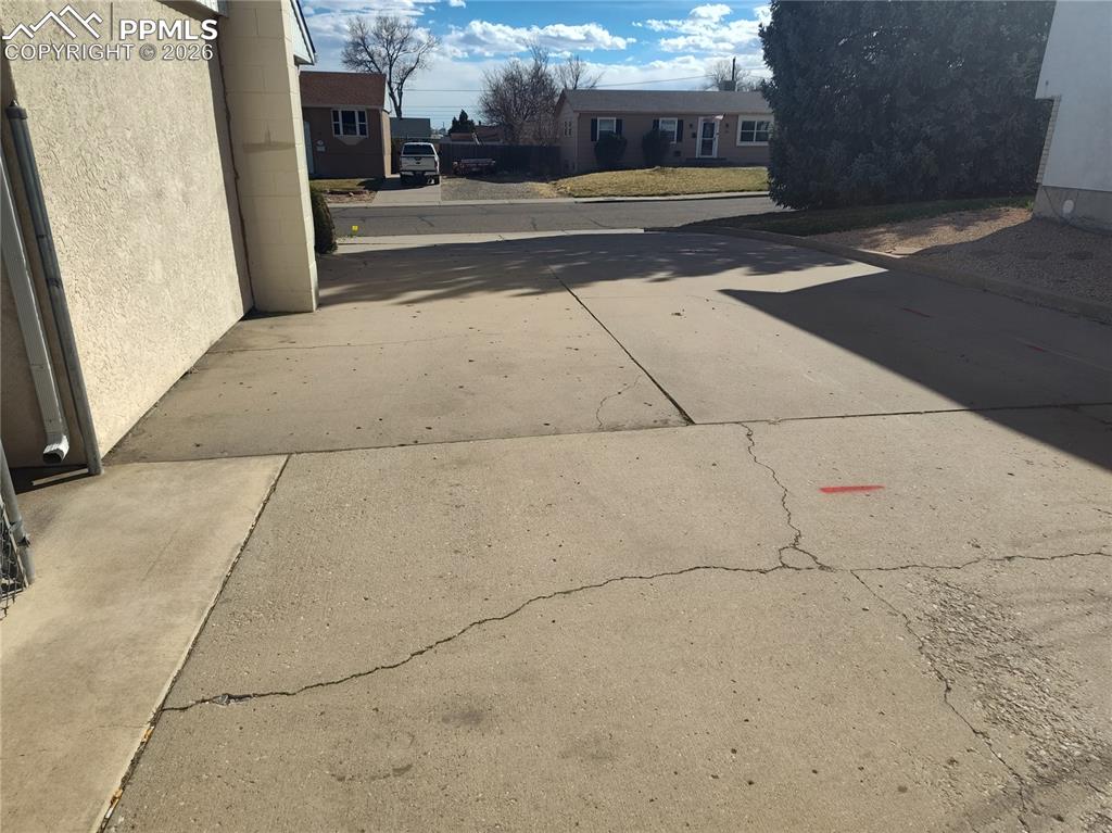 Image 44 of 45: Oversize driveway can accommodate 6 or more vehicles