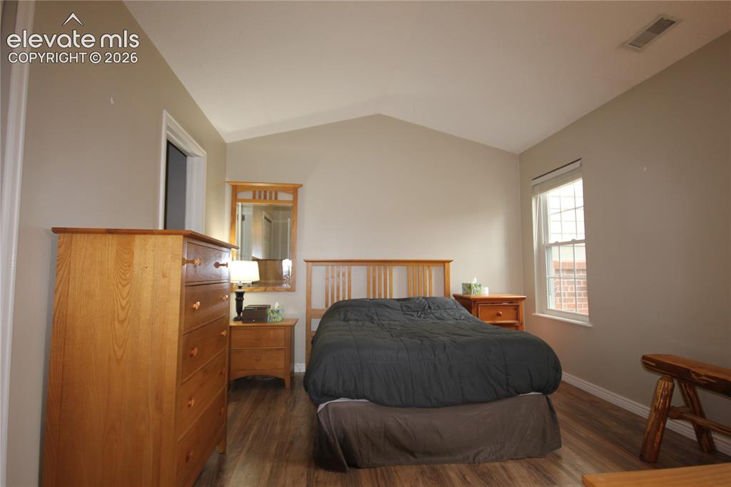 Image 18 of 33: Vaulted Ceilings in Primary Bedroom 