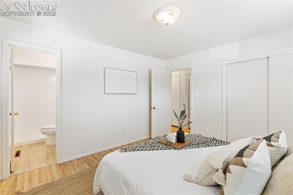 Image 15 of 31: PRIMARY BEDROOM WITH EN SUITE 