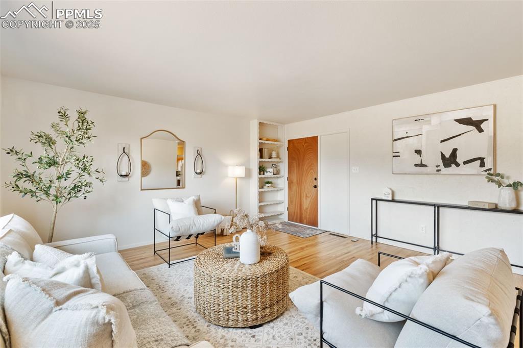 Image 5 of 31: CHARMING BUILTINS IN LIVING ROOM
