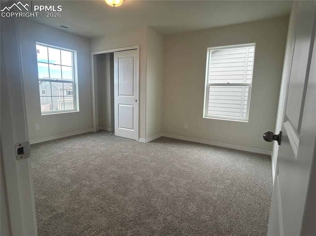 Image 8 of 14: Bedroom