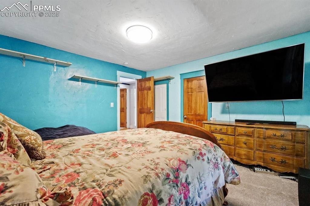 Image 19 of 28: View of carpeted bedroom