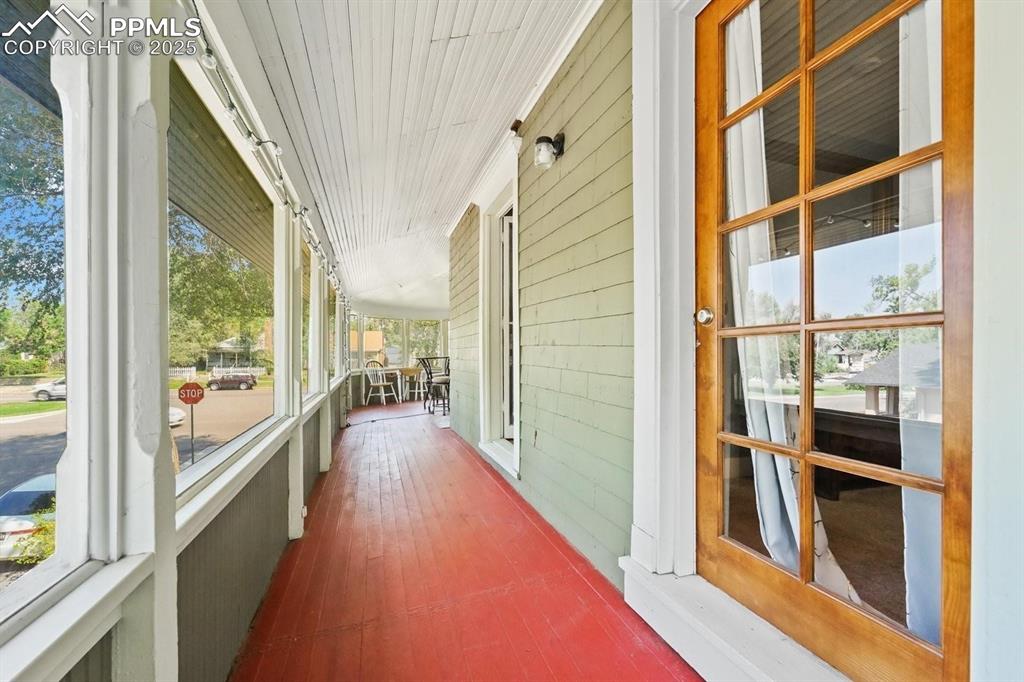 Image 23 of 28: Unfurnished sunroom featuring plenty of natural light
