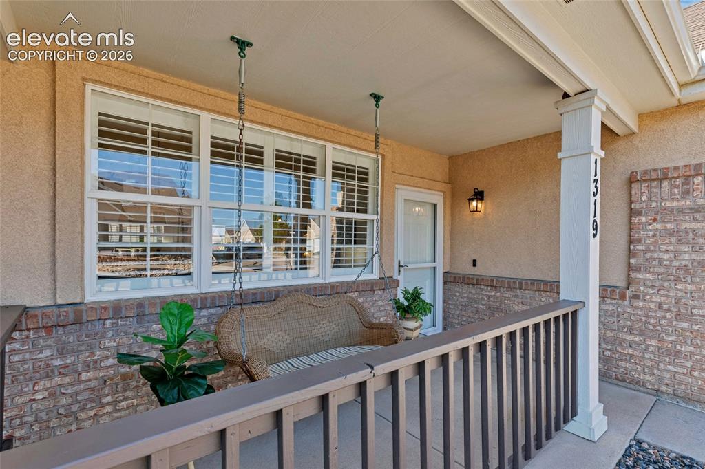 Image 2 of 26: Set against a breathtaking mountain backdrop, this home