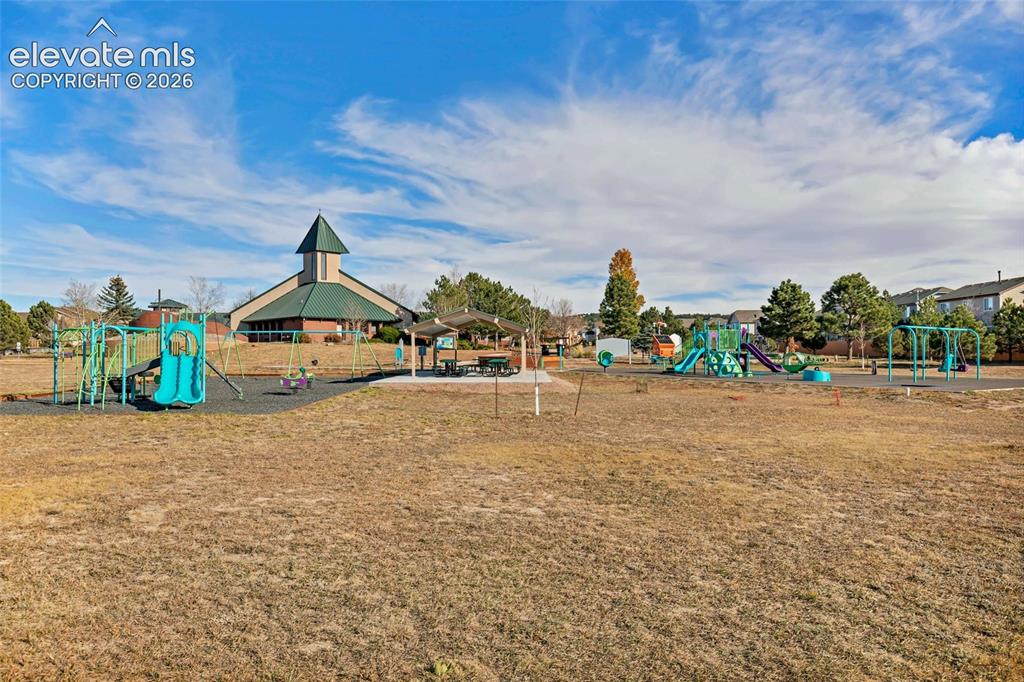Image 25 of 26: Community playground behind home.