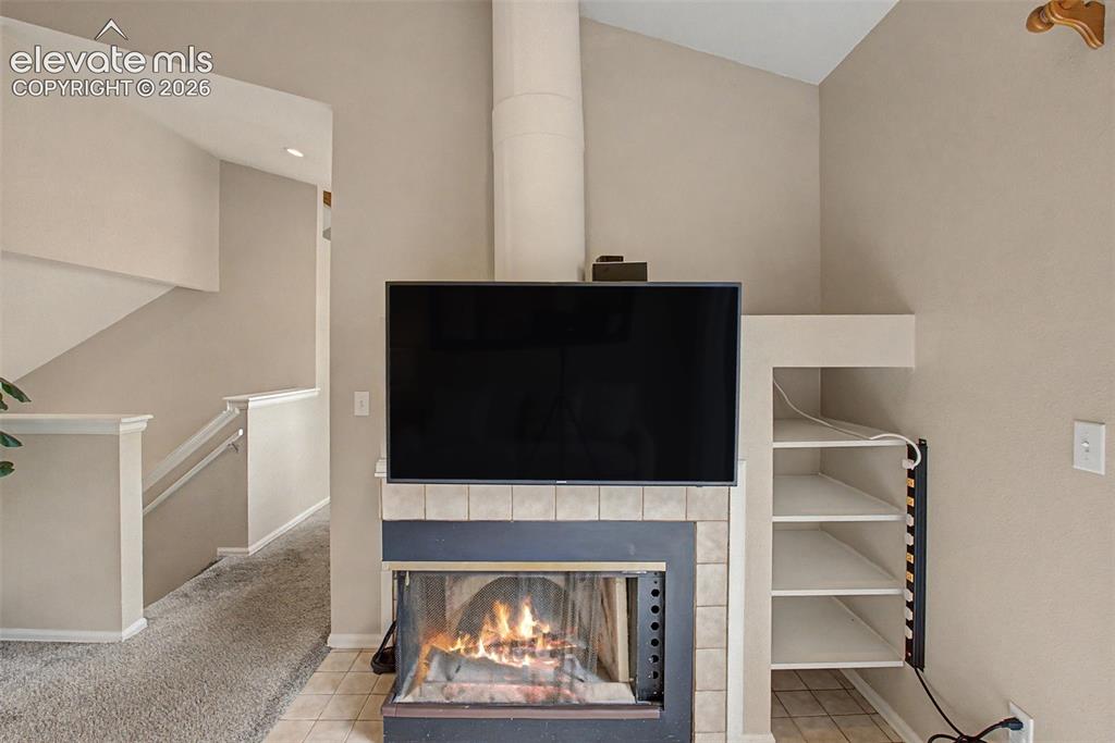 Image 10 of 43: Fireplace