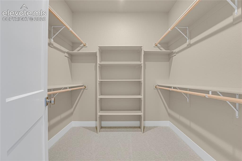 Image 16 of 42: Large walk-in closet