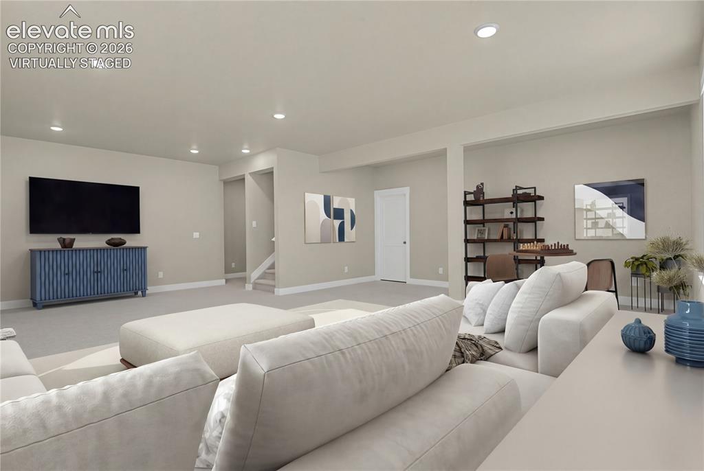 Image 21 of 42: Finished basement. Virtually Staged