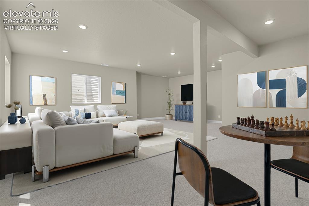 Image 22 of 42: Finished basement. Virtually Staged