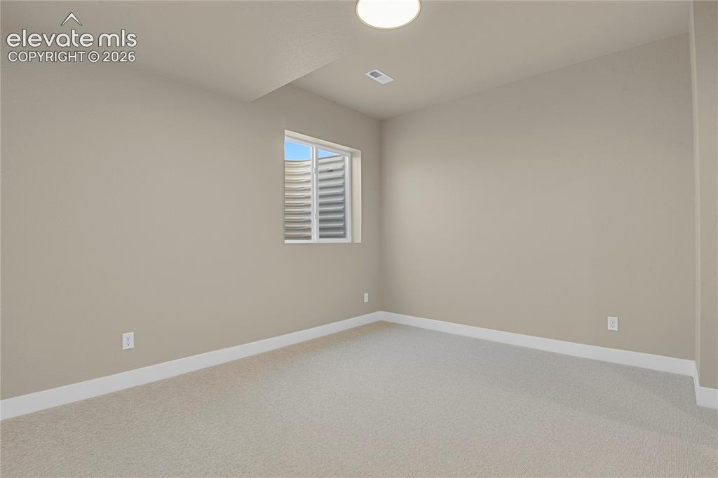 Image 23 of 42: Third bedroom