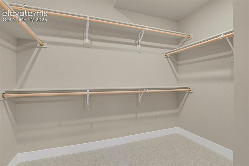 Image 25 of 42: Walk-In Closets