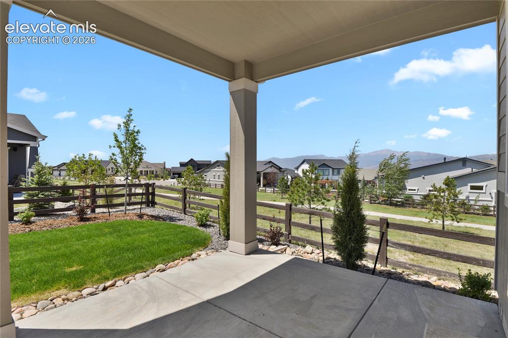 Image 3 of 42: Covered rear patio