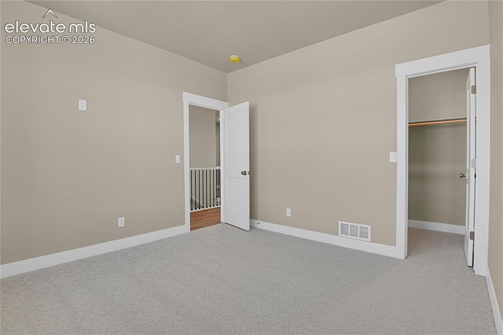 Image 39 of 42: Main level bedroom