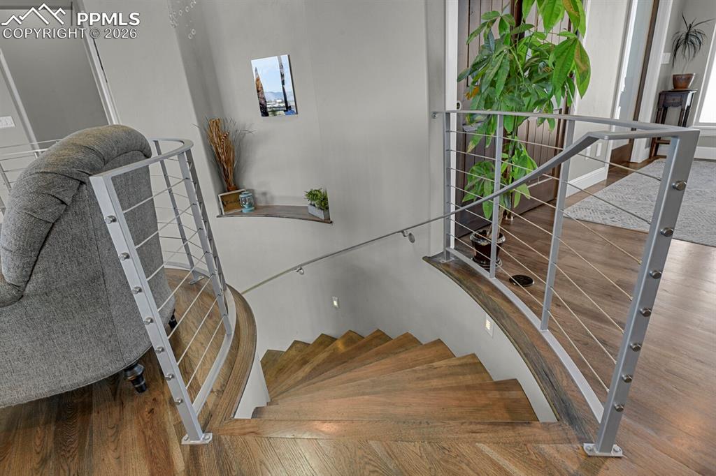 Image 4 of 43: Curved Hickory staircase