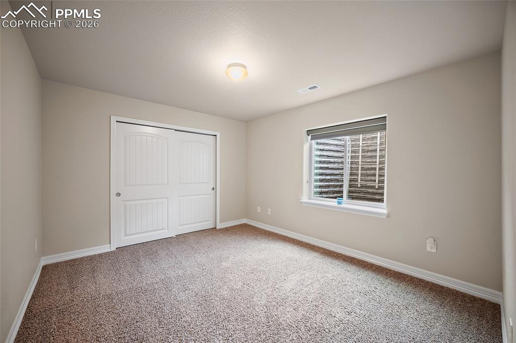 Image 37 of 50: Basement bedroom 