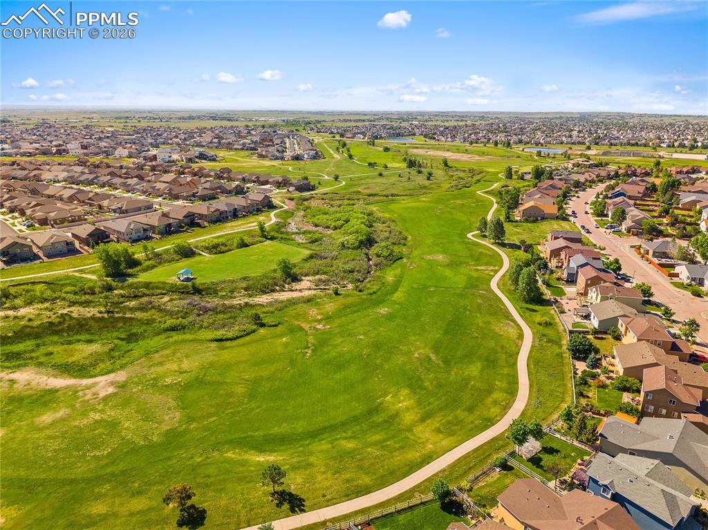 Image 46 of 50: Trails, green space and golf course. 