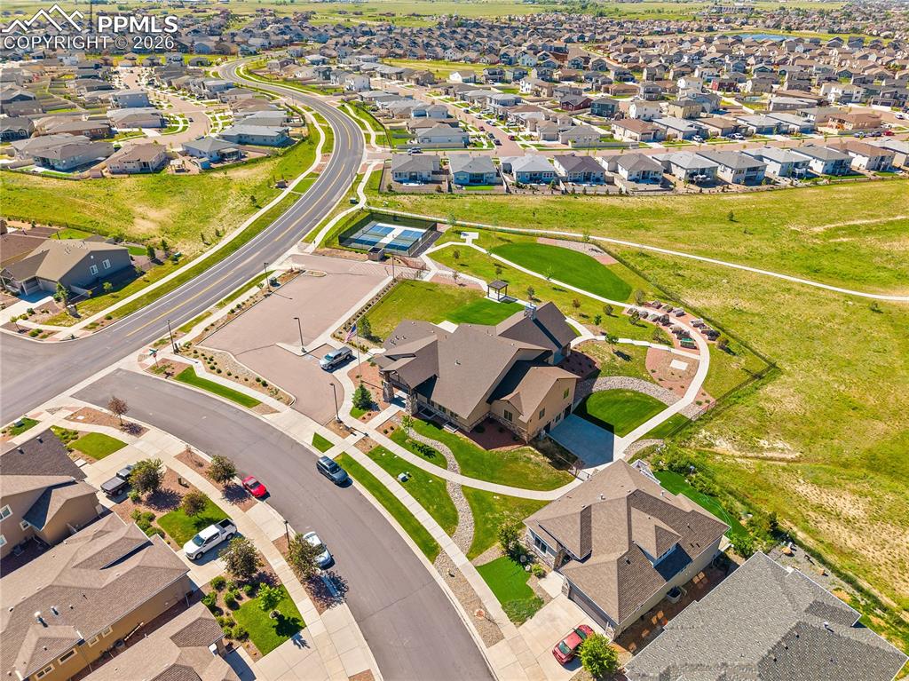 Image 48 of 50: Community center, pickle ball and community garden space. 