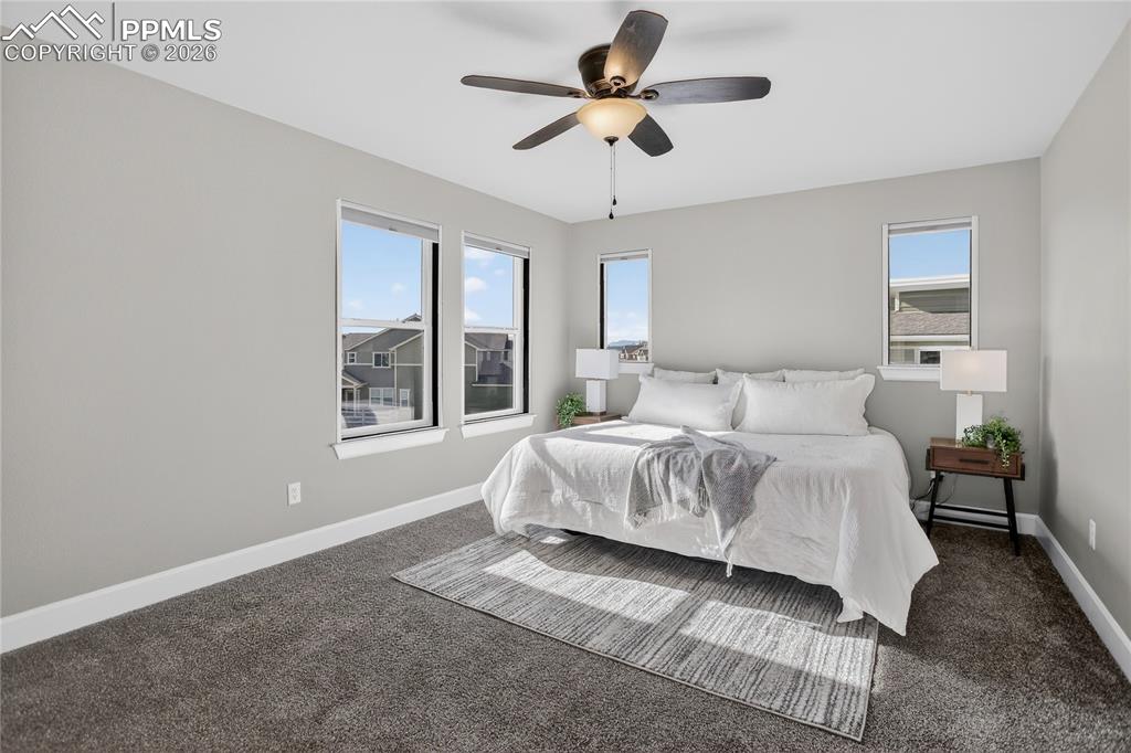 Image 8 of 17: Primary suite w/ blackout shades - upper level