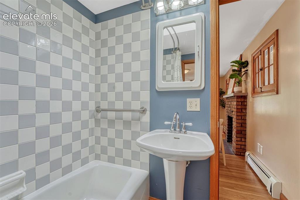 Image 20 of 42: Updated with tub/shower
