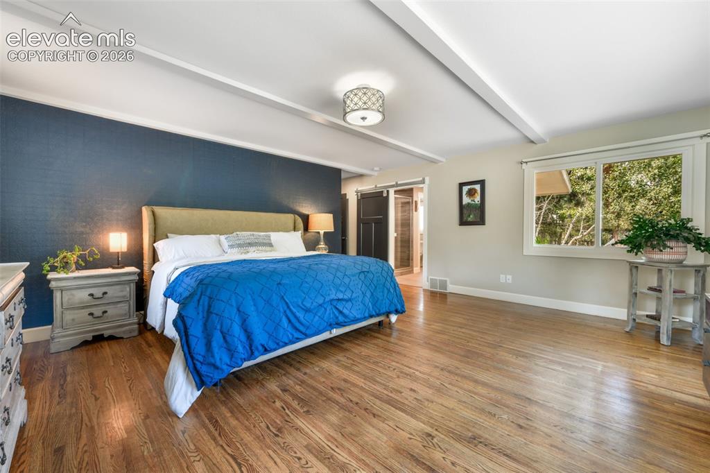 Image 19 of 50: Master Bedroom