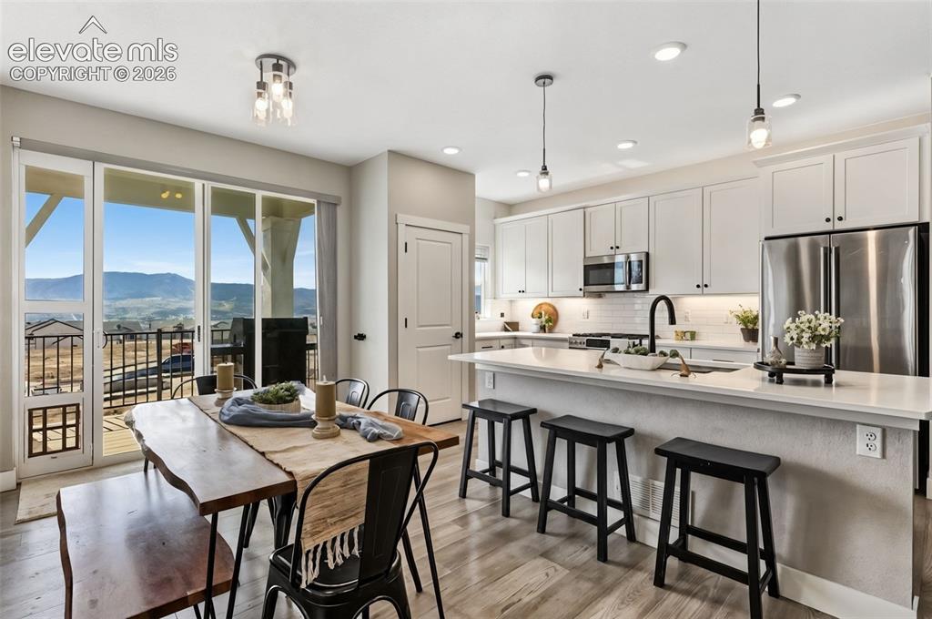 Image 12 of 46: Kitchen w/ oversized island