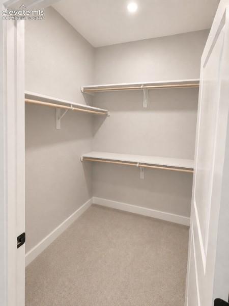 Image 32 of 41: Laundry area on the main w/ full bath on the left