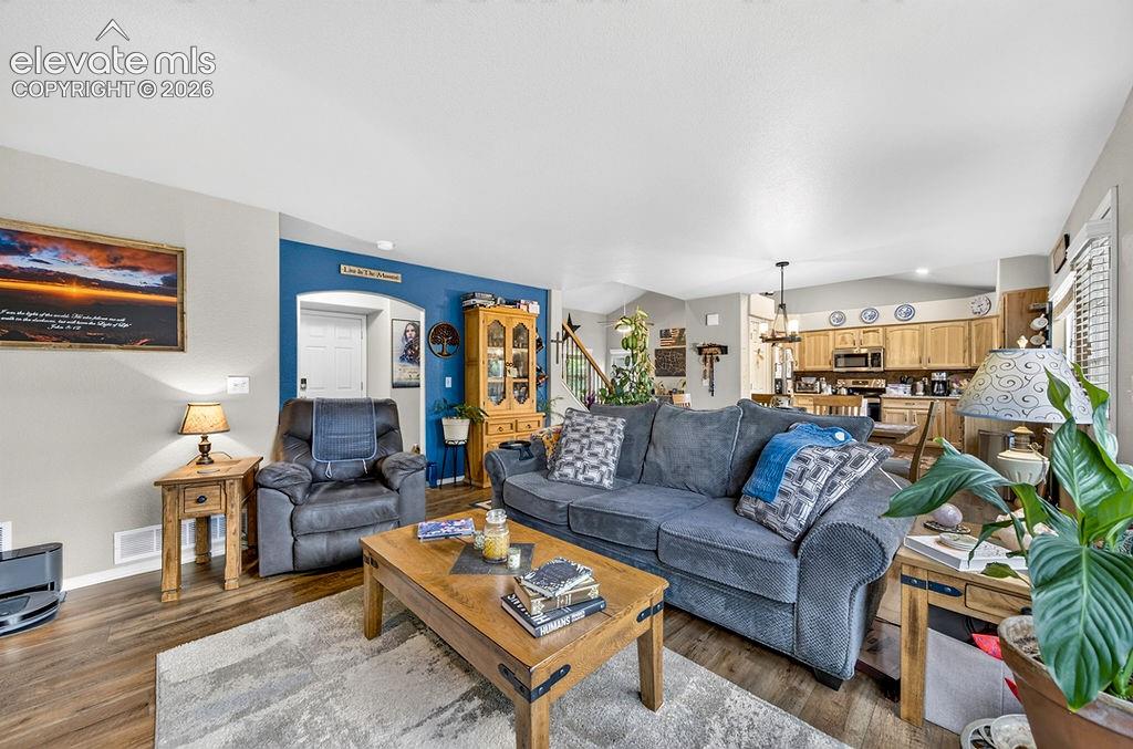 Image 13 of 44: The Family Room is located right off the Dining Area and Kitchen making it