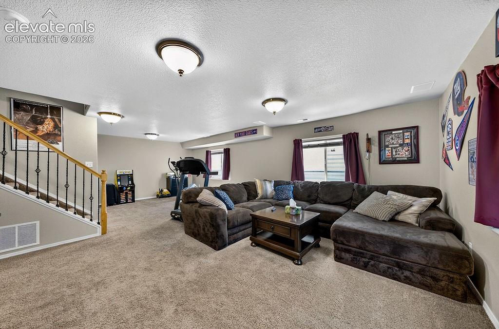 Image 32 of 44: The Finished Basement expands your living space with a large, versatile 2nd