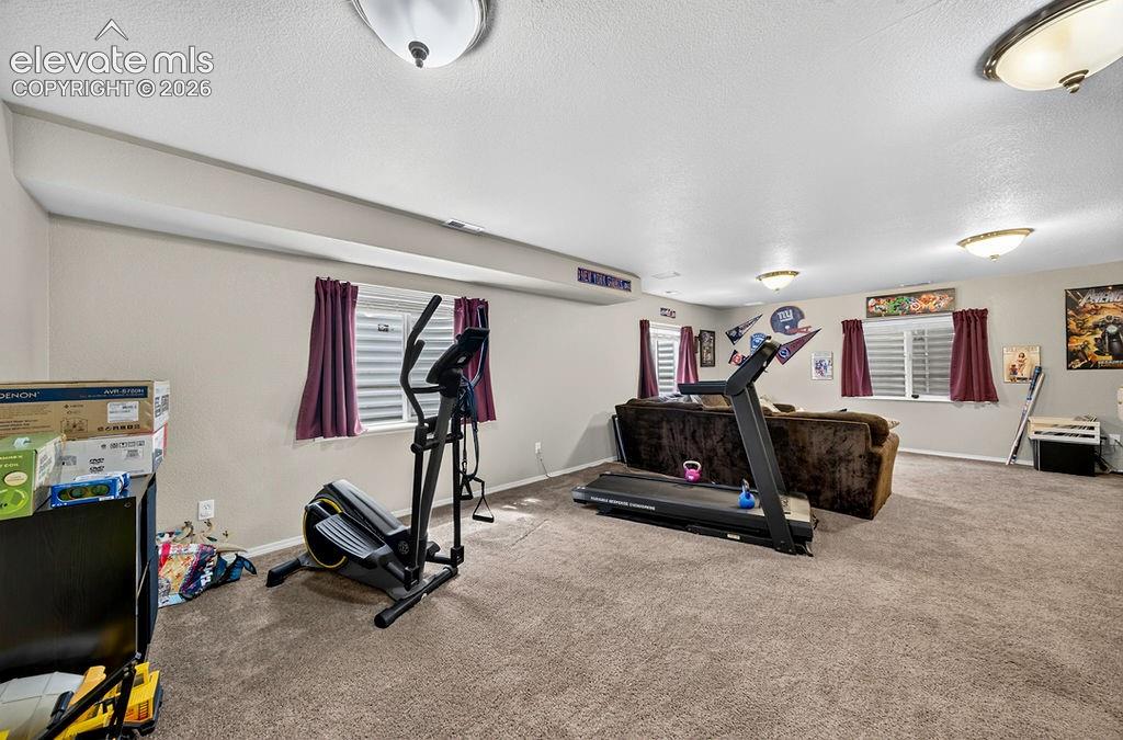 Image 35 of 44: Basement Family Room.