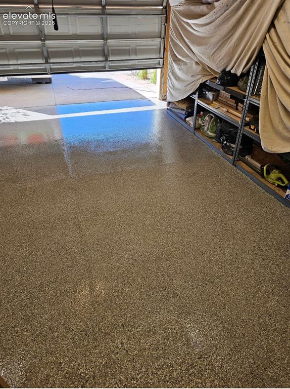 Image 44 of 44: Epoxy flooring in garage.