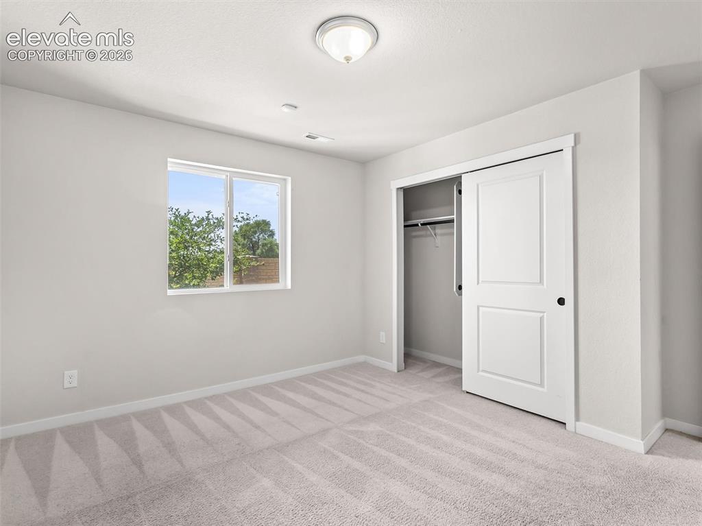 Image 18 of 33: Bedroom