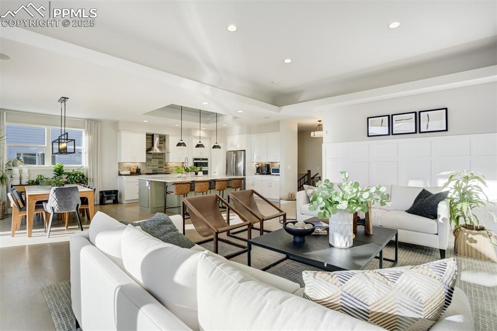 Image 12 of 50: Living room off kitchen and dining room!