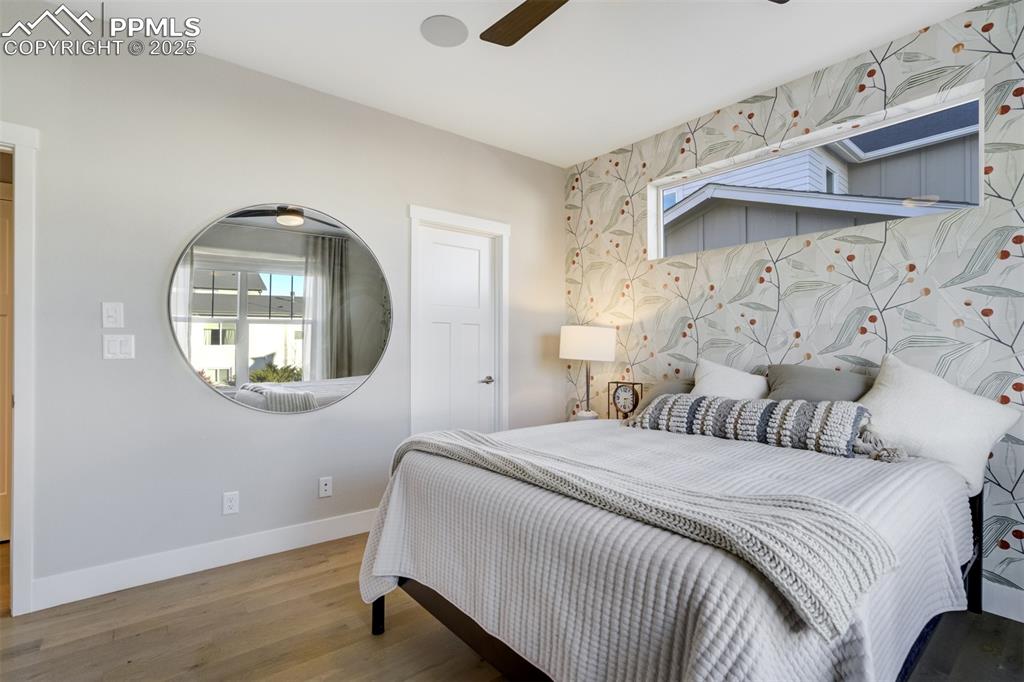 Image 25 of 50: A second bedroom on main floor