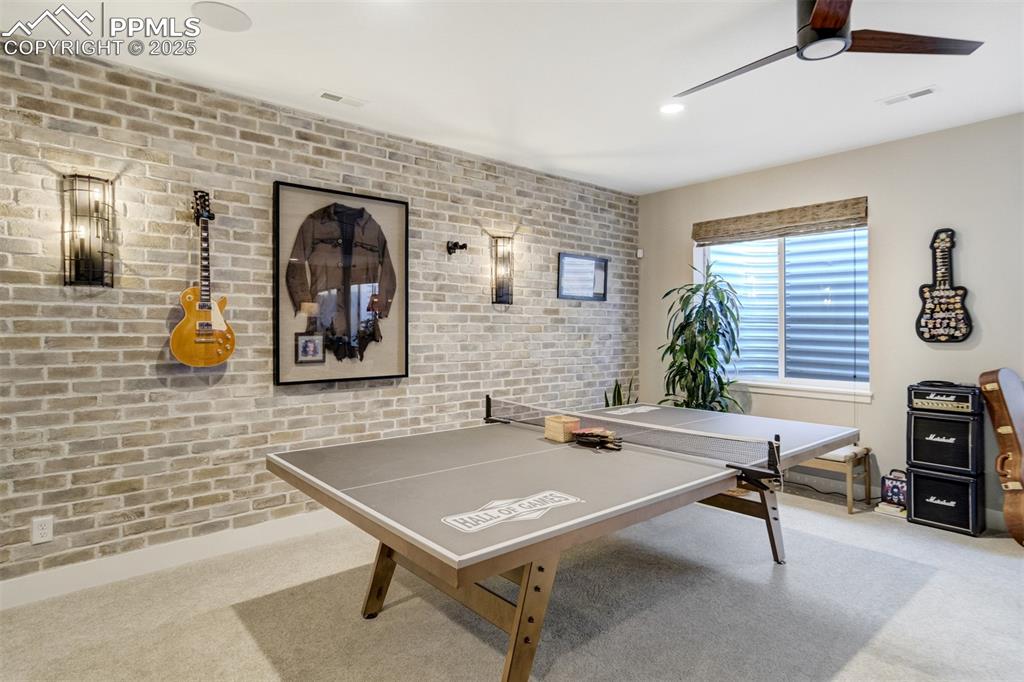Image 32 of 50: Perfect rec area with a brick wall!