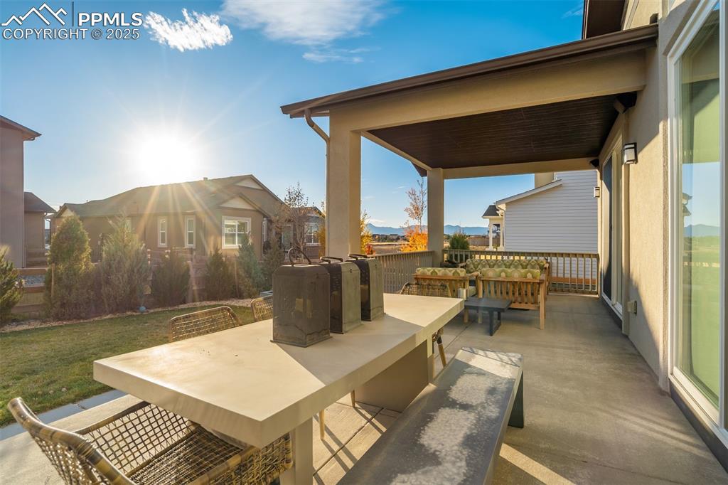 Image 34 of 50: Extended patio offers options for use