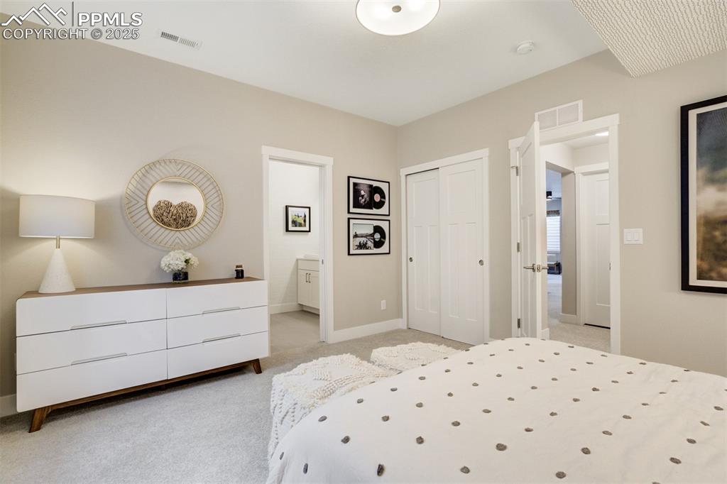 Image 35 of 50: Bedroom number 3 located in basement is spacious