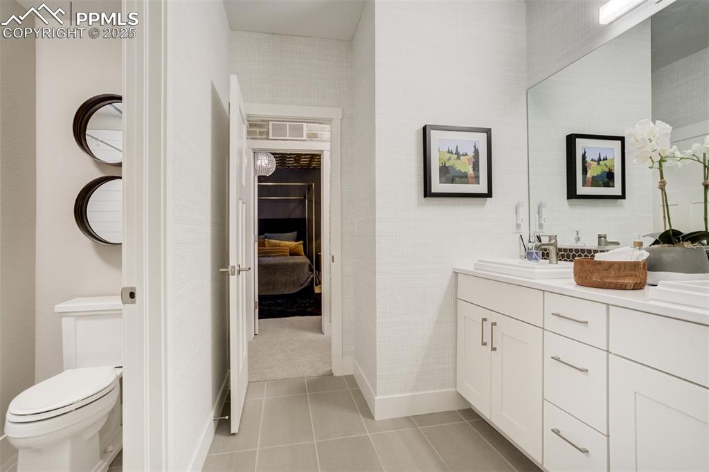 Image 39 of 50: A half bath in basement