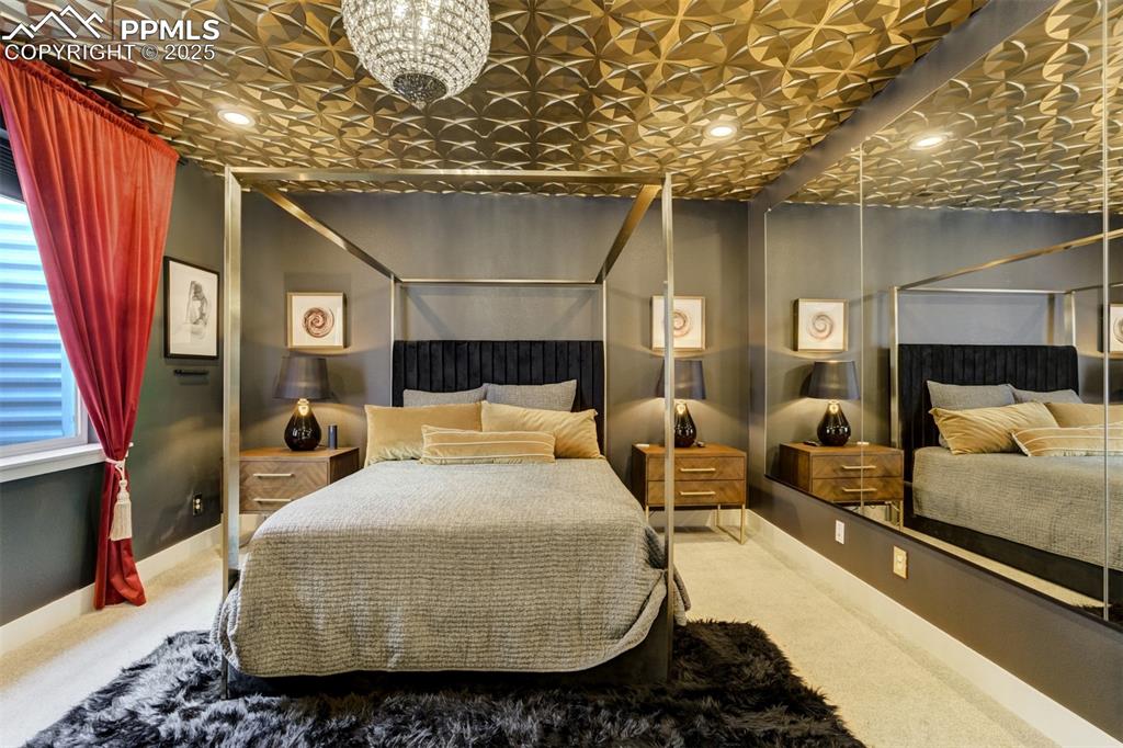 Image 40 of 50: Fourth bedroom with so many options for use!  Would be a great fitness room