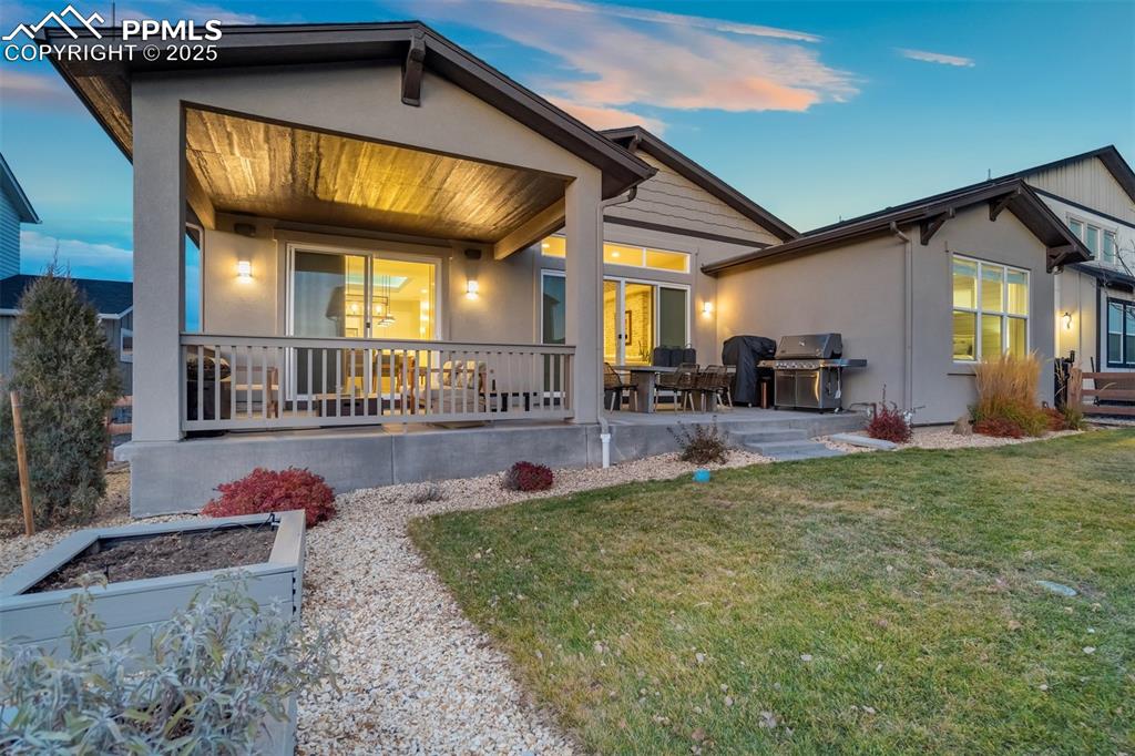 Image 43 of 50: Covered patio off kitchen